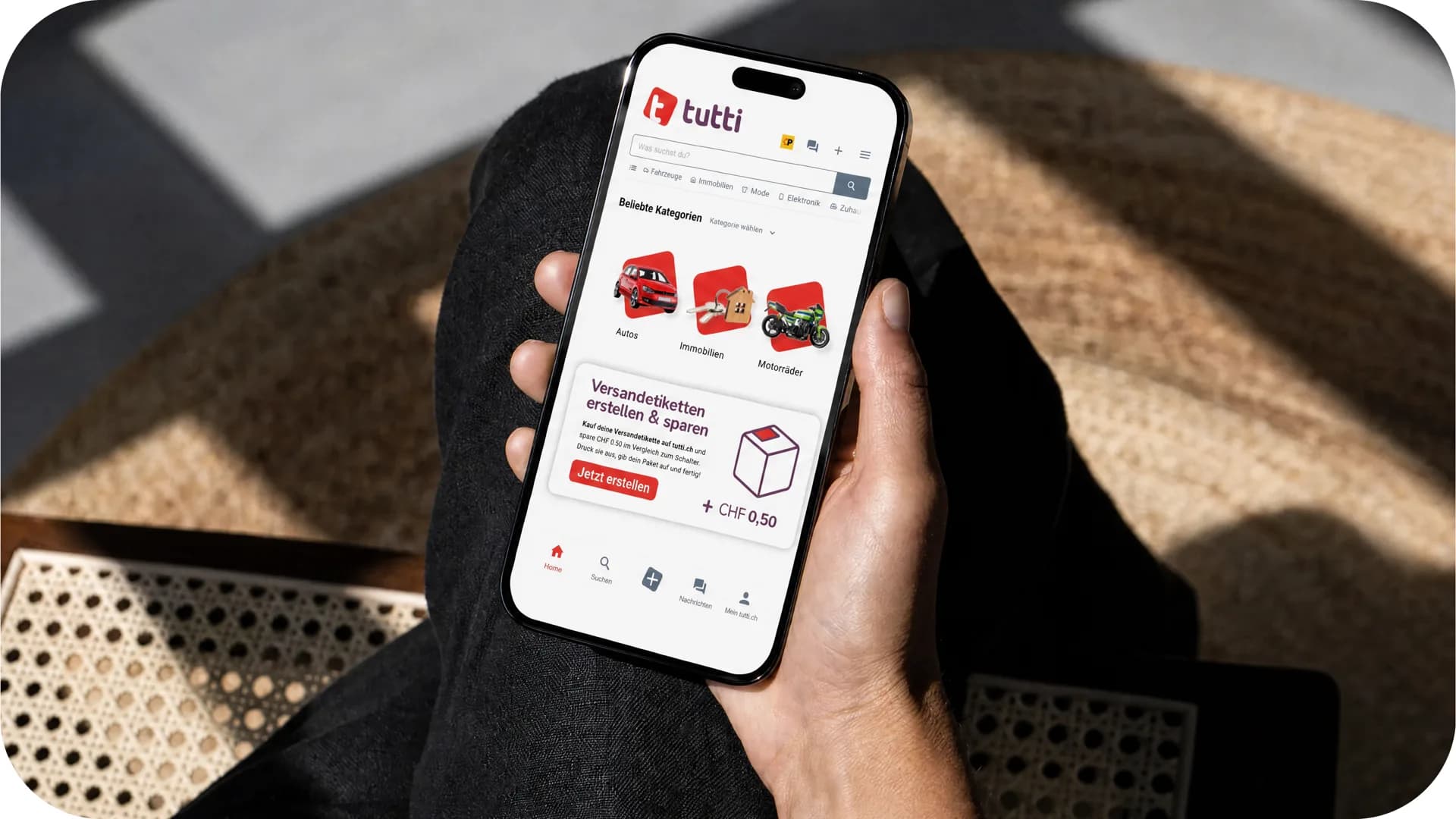 The tutti app on a smartphone in someone’s hand