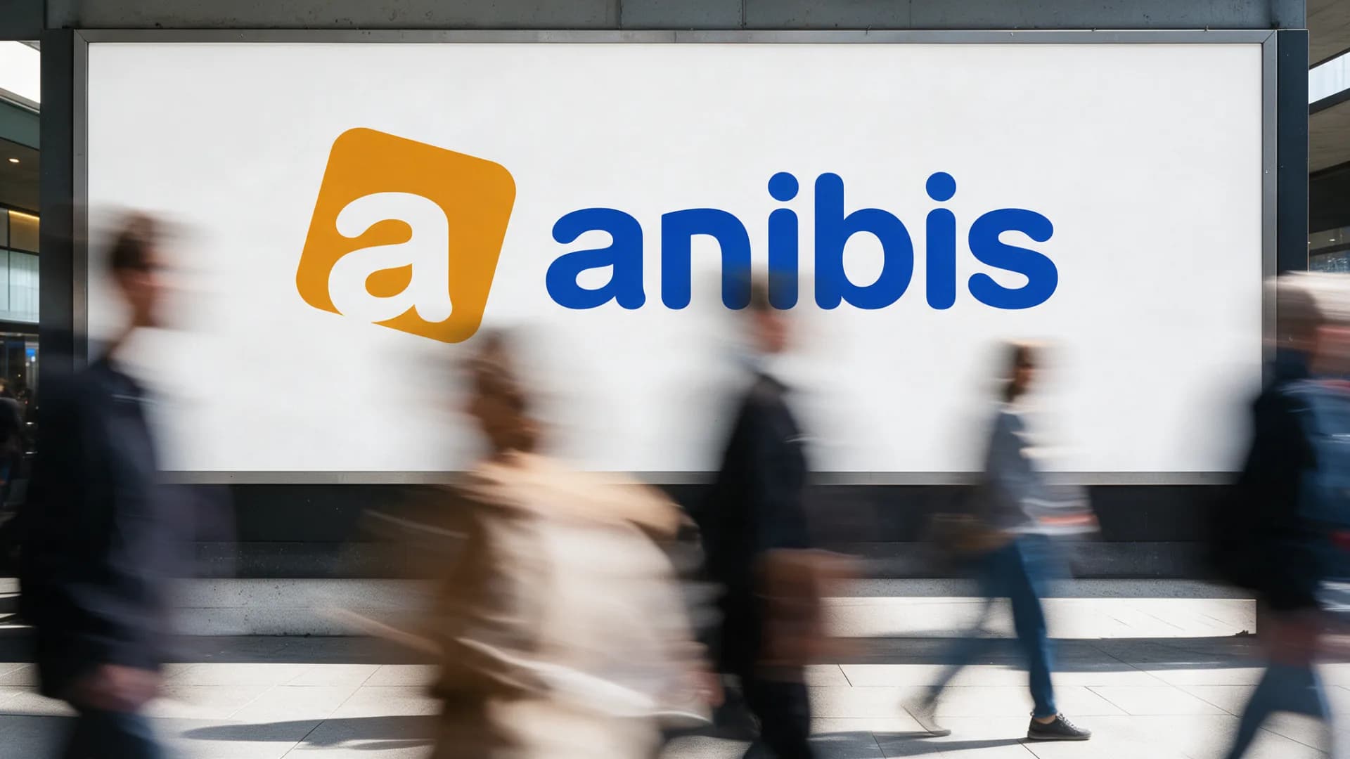A large poster with the anibis logo by day, passers-by in motion in front of it